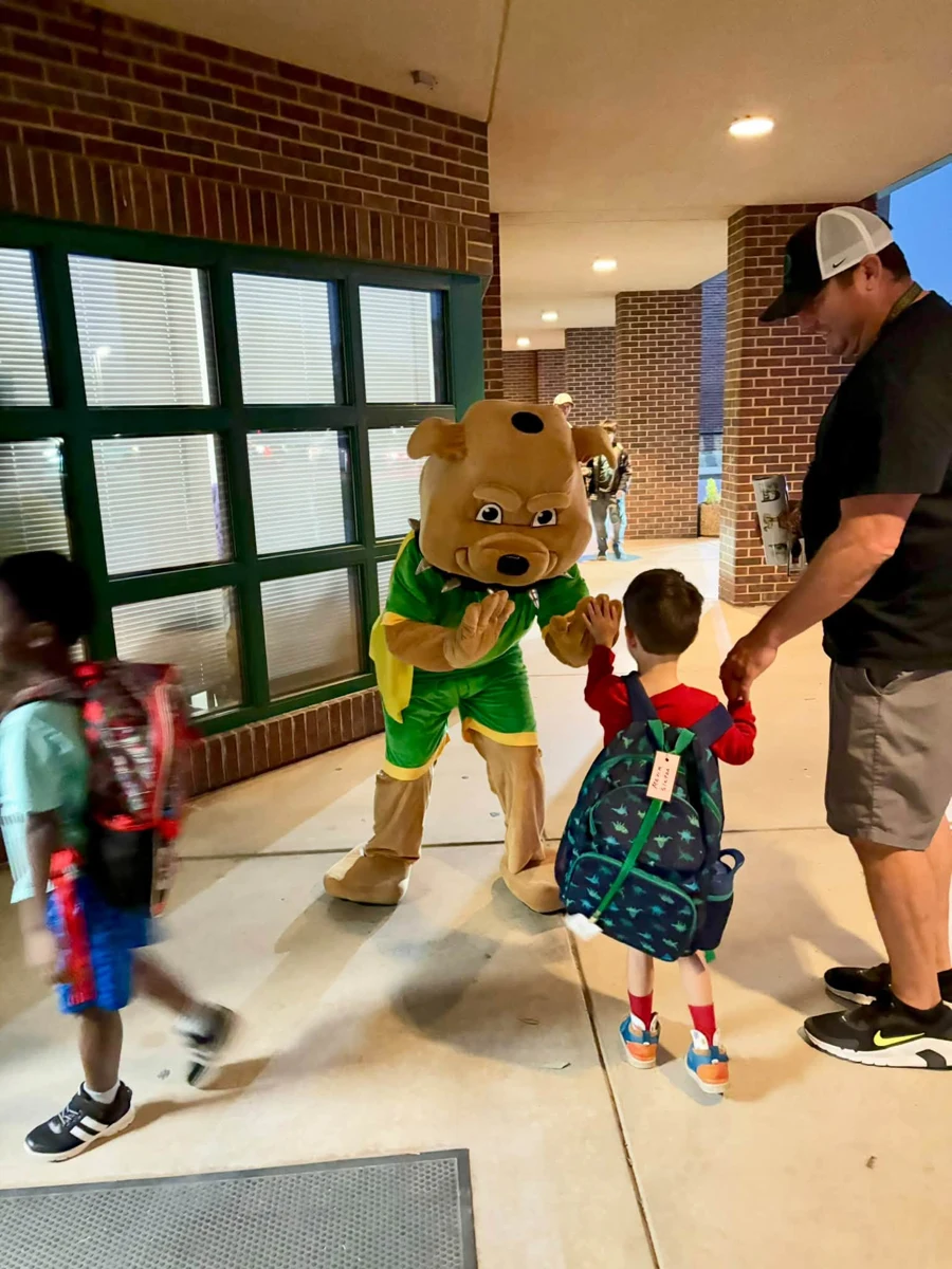 CHOMP mascot greeting students at Boyd Elementary