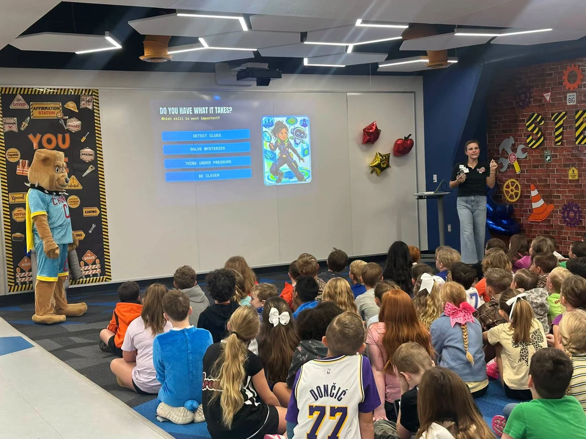 Students listening to a presentation at Enis Elementary
