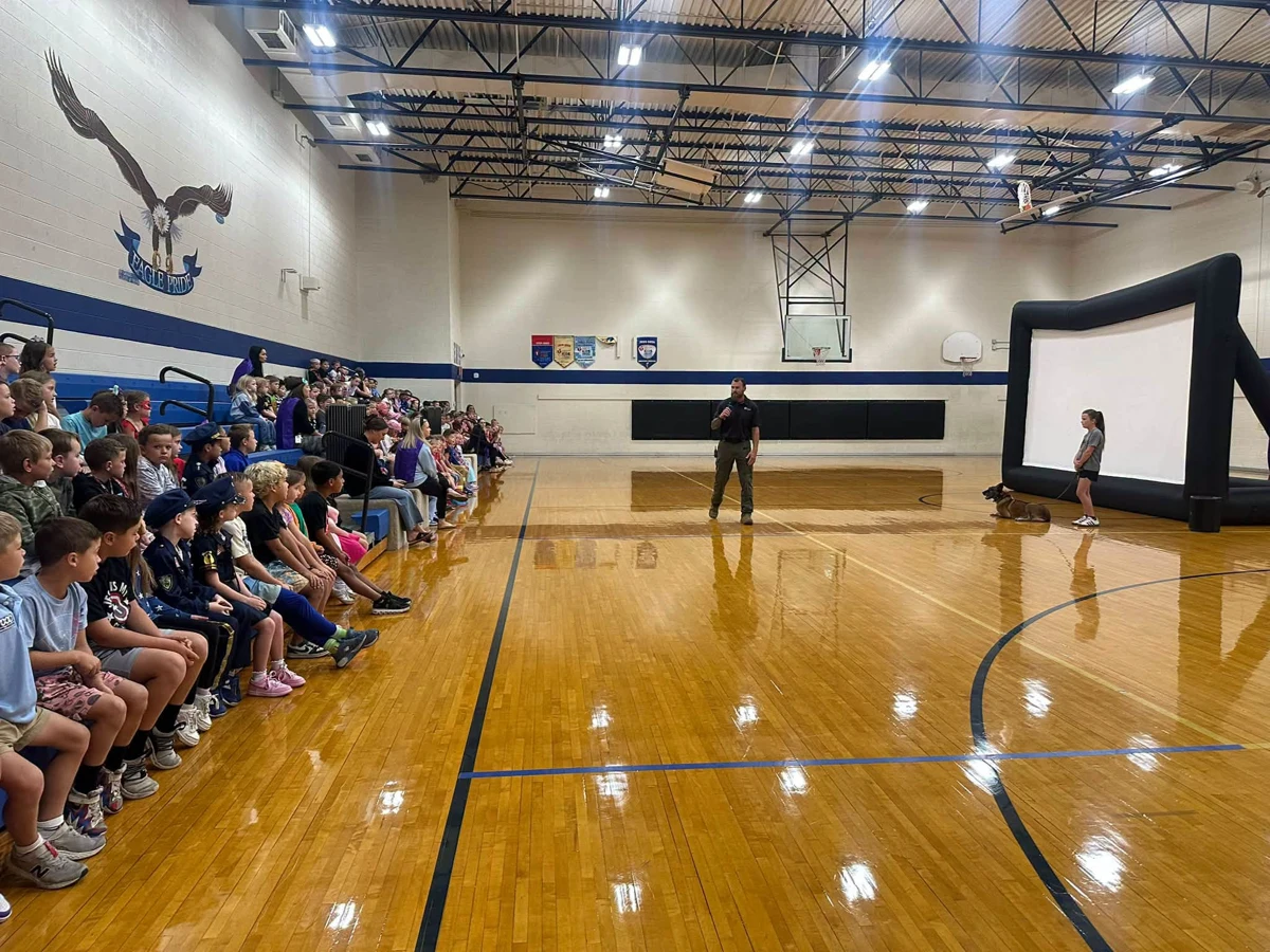 Students gathered for a presentation in the school gym